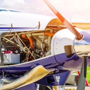 Turboprop airplane aircraft a propeller chrome luster with open bonnet repair, engine check